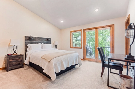 Hilltop bedroom with patio looking out towards lake