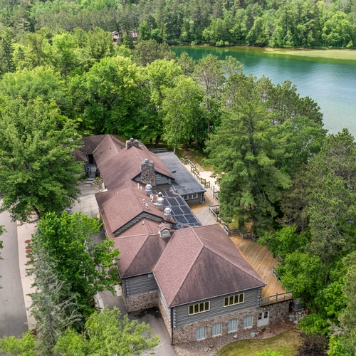 Aerial view of the main lodge with the lake in the background